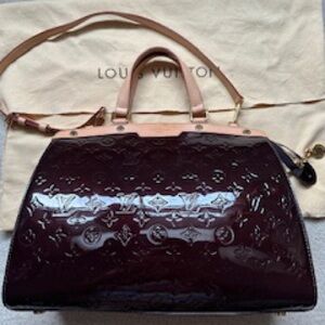 Louis Vuitton Brown Satchel with Embossed Monogram